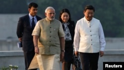 Thủ tướng Ấn Độ Narendra Modi và Chủ tịch Trung Quốc Tập Cận Bình tại Ahmedabad, ngày 17/9/2014.