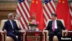 Ngoại trưởng Mỹ John Kerry nói chuyện với Chủ tịch Trung Quốc Tập Cận Bình Sảnh đường Nhân dân Bắc Kinh, ngày 7/6/2016.